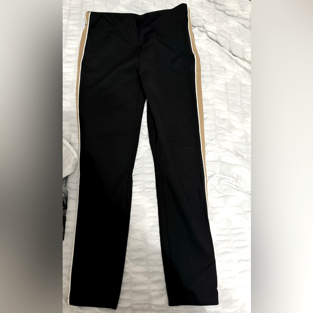 Black stretchy pants tights with tan side stripes